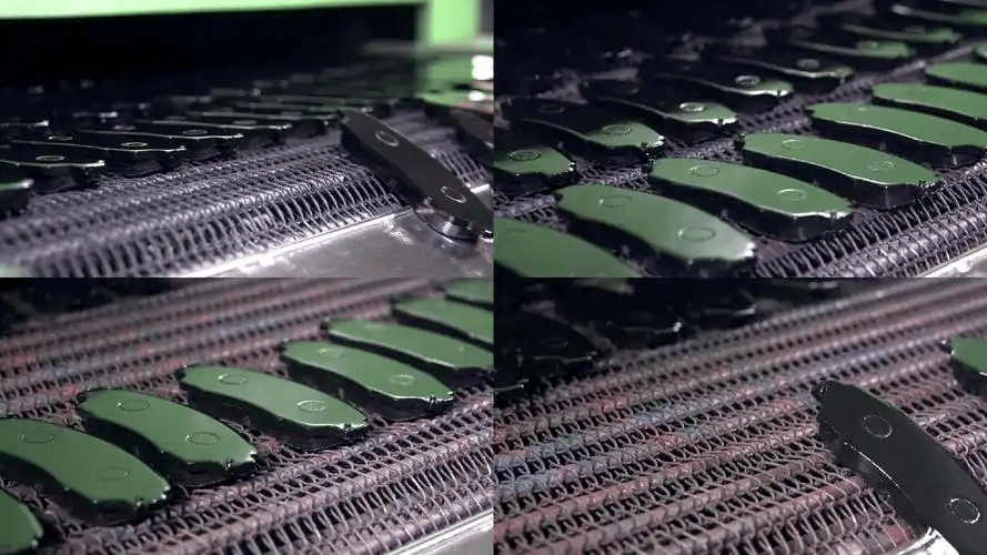 Brake pad manufacturing production line showing batch processing and quality inspection on conveyor system for OEM and aftermarket supplier evaluation and factory capability assessment