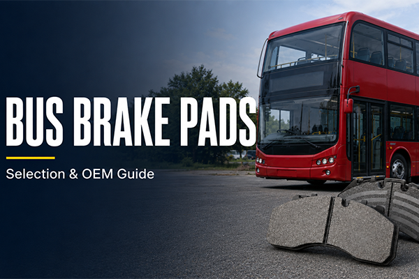 Red double-decker bus with commercial bus brake pads in the foreground